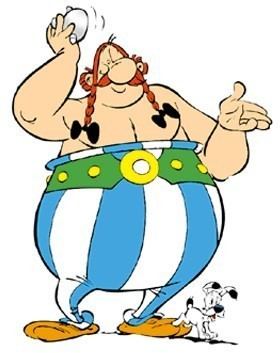 Obelix smiling while a black and white dog at his side