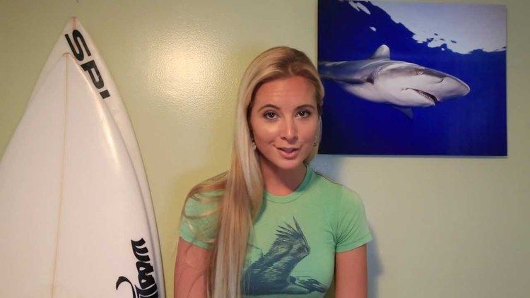 Ocean Ramsey with long blonde hair and wearing a mint-green shirt.