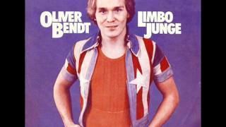 Oliver Bendt smiling while wearing a red shirt underneath a blue, red, and white polo on the album cover of "Limbo junge"