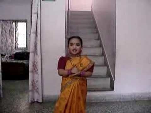 A young lady wearing an Indian traditional dress.