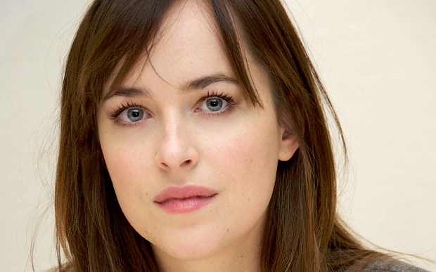 One of Her Own movie scenes The actress Dakota Johson plays Anastasia Steele in the new Fifty Shades of Grey film