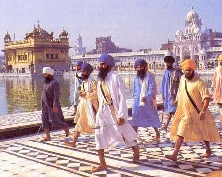 Eight armed men at the Golden Temple.