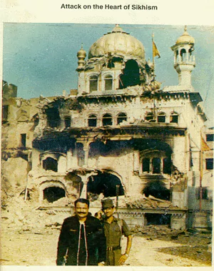 The Golden Temple after the assault of Operation Blue Star with two men standing in front.
