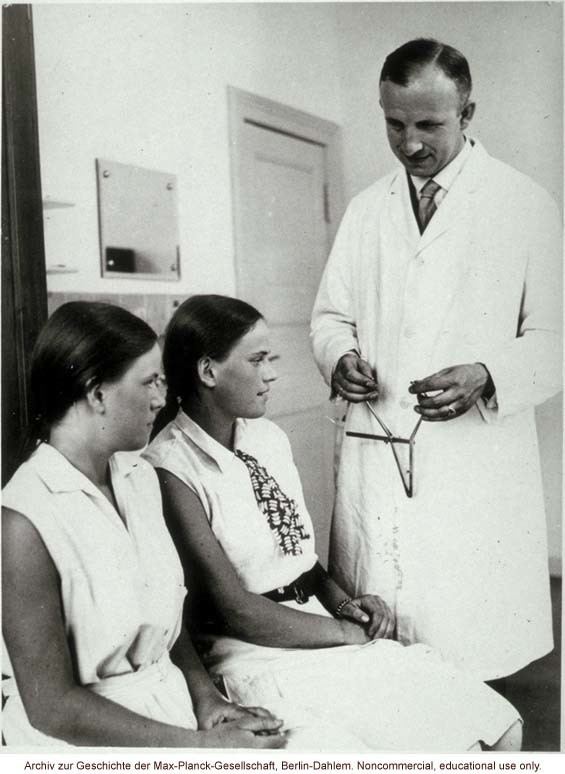 Otmar Freiherr von Verschuer 16yearold female twins undergoing anthropometric study by Otmar