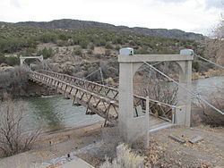 Otowi Suspension Bridge httpsuploadwikimediaorgwikipediacommonsthu