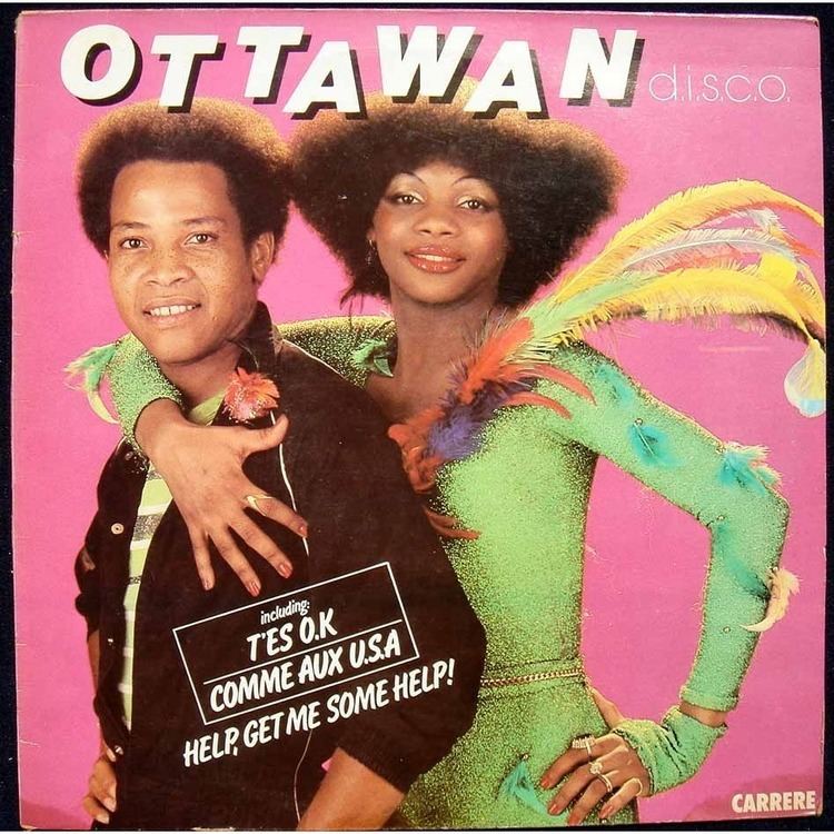 Jean Patrick Baptiste and Annette Eltice of the Ottawan duo are smiling on their album cover of Ottawan D.I.S.C.O.