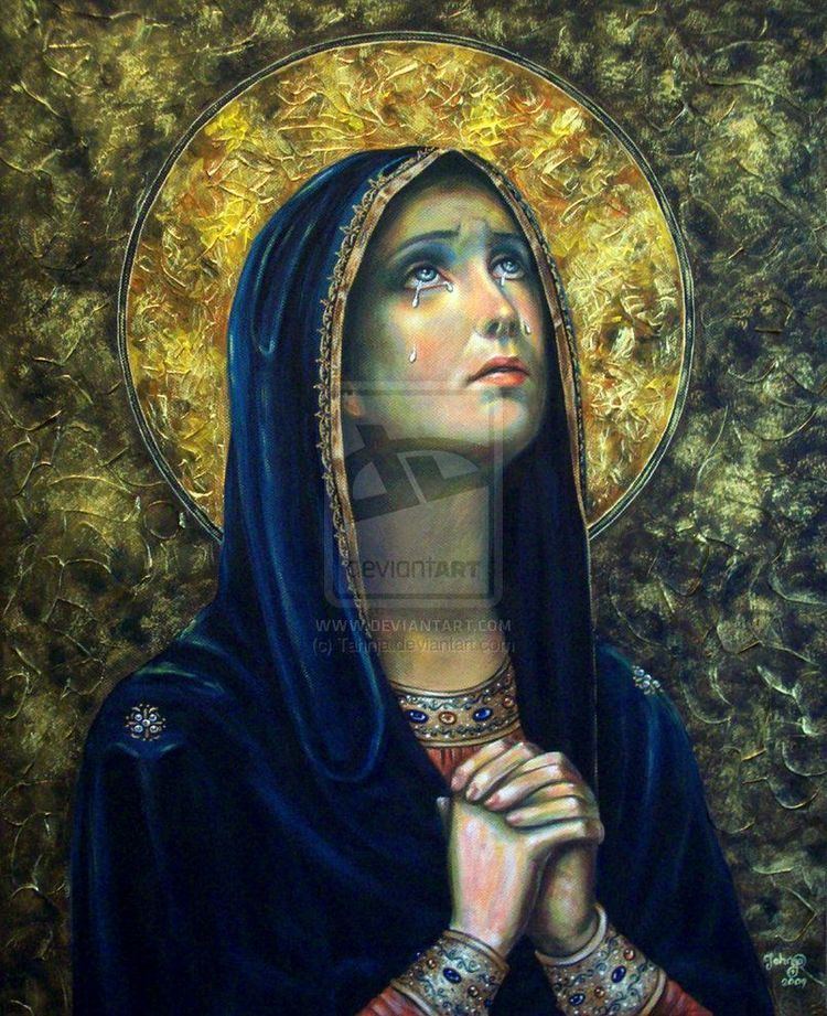 Portrait of Our Lady of Sorrows crying while praying and wearing a blue veil and brown long sleeve dress