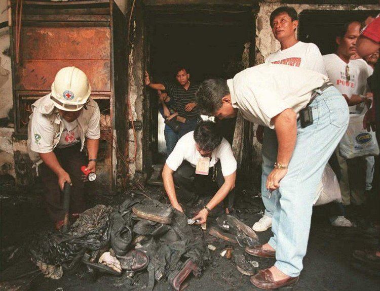 The retrieval of burned human bodies after the Ozone Disco fire incident
