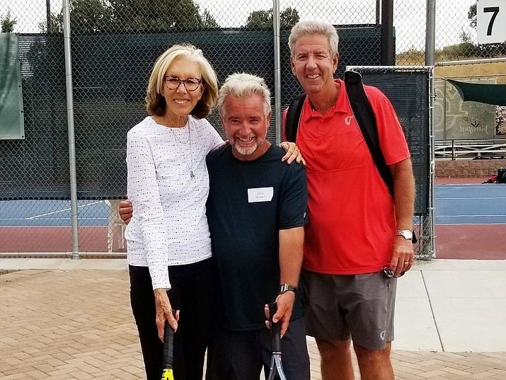 Pam Austin, Chris Howard and John Austin pose for a photo by the Austin family induction brick Sunday, Sept. 30, 2018, in Prescott. (Chris Howard/Courtesy)