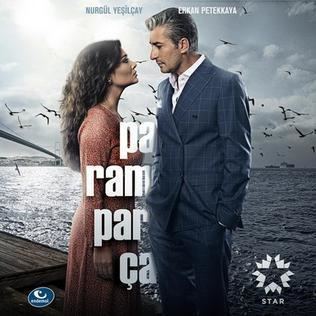 Poster of "Paramparça", a Turkish television drama series featuring Nurgül Yeşilçay and Erkan Petekkaya.