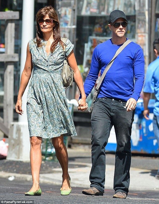 Paul Banks (musician) Helena Christensen holds hands with boyfriend of six years