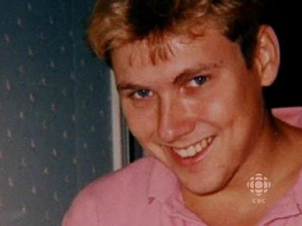 Paul Bernardo  wearing a pink collared shirt