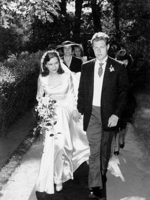 Paulina Longworth wearing her wedding gown with her husband Alexander McCormick Sturm wearing his suit on their wedding day.