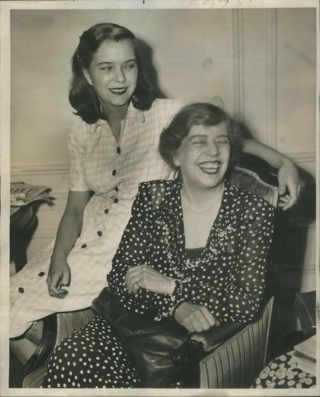 Paulina Longworth wearing a dress with her mother Alice Roosevelt with a smile on their faces.
