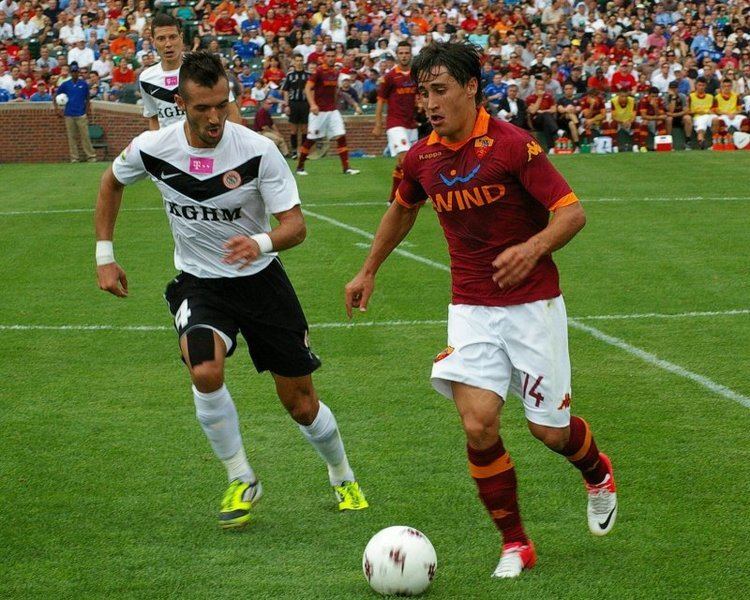 Pavel Vidanov AS Roma39s Bojan Kricic marked by Pavel Vidanov photo