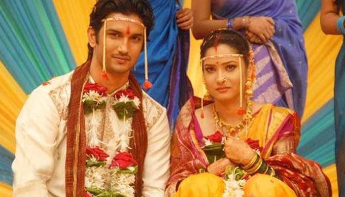 Sushant Singh Rajput and Ankita Lokhande smiling while wearing a traditional costume in the 2009 soap opera, Pavitra Rishta