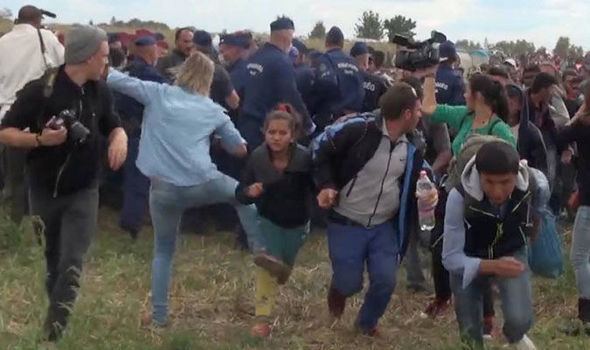 Petra László incident Hungarian camerawoman Petra Laszlo who tripped refugee claims she