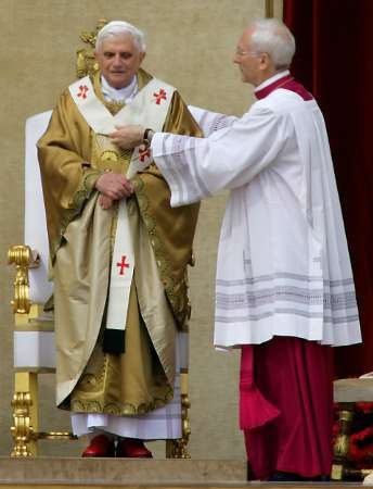 Piero Marini Bishop Piero Marini R helps German Pope Benedict XVI to
