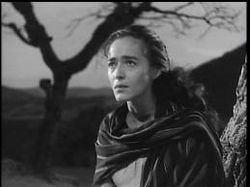 Pina Pellicer looking afar in a movie scene from the 1961 film One-Eyed Jacks