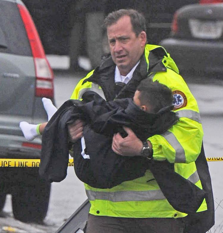 Police Rescue Lawrence police rescue boy after barricaded gunman wounds girlfriend