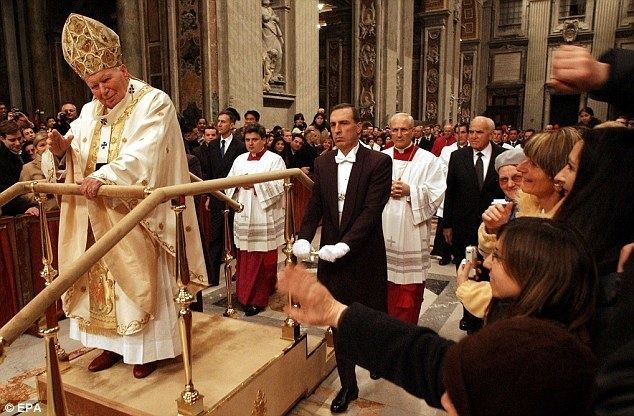 Pope John Paul II (miniseries) movie scenes An ailing Pope John Paul II arrives for midnight Mass at St Peter s Basilica in December