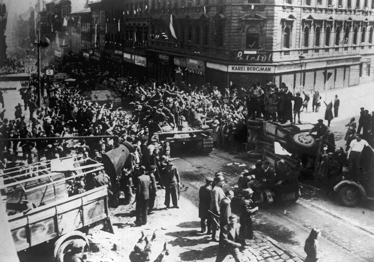 Prague Offensive Residents and fighters of Prague Uprising greet Soviet tanks and