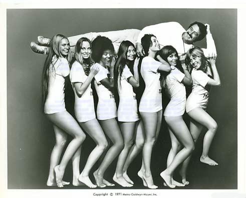 Rock Hudson was carried by Joy Bang, Gretchen Carpenter, Joanna Cameron, Aimee Eccles, June Fairchild, Margaret Markov, and Brenda Sykes, casts of Pretty Maids All in a Row (1971 film).