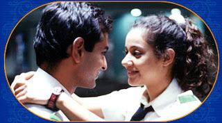 Mayank Anand and Karishma Randhawa are smiling while staring at each other in a scene from the 2004 television series, Princess Dollie Aur Uska Magic Bag