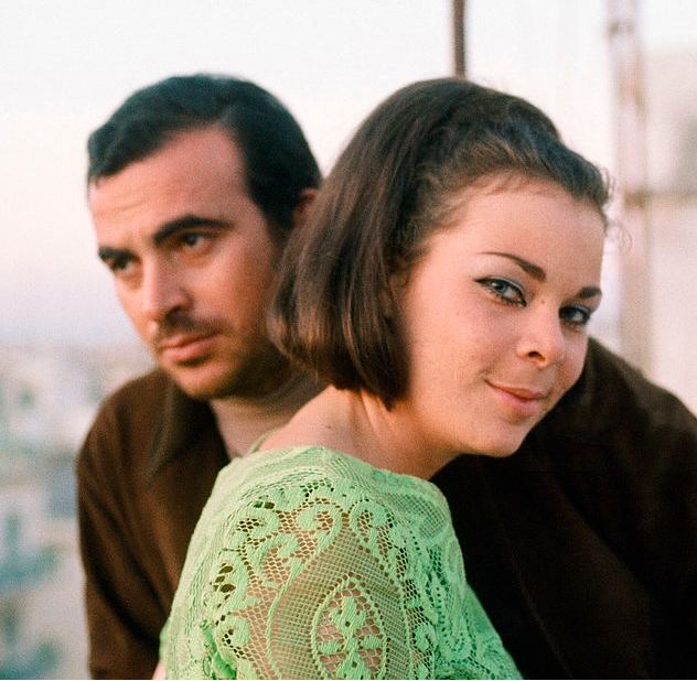 Princess Maria Beatrice of Savoy leaning her head on the shoulder of Italian actor Maurizio Arena