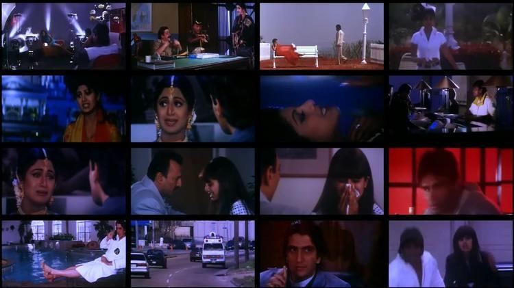 In the movie scene of Prithvi 1997, from left, 1st-row column 1, a group of people in a room with white lights at the back, 1st-row column 2, three men talking, in a room and green table in the table, from left is a man sitting with black hair and mustache, in the middle, is a man sitting arms crossed, has black hair wearing a black hat, at the right a man standing has black hair wearing a black long sleeve and denim pants, 1st-row column 3, two people in a place, with white bench and white street light on the right, from left is a woman with black hair in a red dress lying on the bench, at the right is a man standing, has black hair, wearing a white coat and white pants. 1st-row column 4, a woman in a park, has black hair, wearing a white shirt and cream pants, 2nd-row column 1, a woman is serious, mouth half open, has black hair wearing a yellow and orange Indian dress, 2nd-row column 2, a woman (left) is scared mouth half open, has black hair wearing a maang tikkas, and gold earrings, in front of her is a man (right), has black hair wearing a  blue shirt, 2nd-row column 3, a woman is smiling, lying, closed eyes, mouth half open, left hand below her neck, has black hair, 2nd-row column 4, on the left is a silhouette of a person in a counter with brown lamps on top, on the right, is a man standing, has black hair wearing a white shirt. 3rd-row column 1, a woman (left) is crying, has black hair, wearing maang tikkas and silver earrings, in front of her, is a man (right) has black hair wearing a blue shirt, 3rd-row column 2, a man (left) is looking at the woman, has black hair and mustache, wearing a blue polo, in front of him is, a woman (right) is crying, looking down closed eyes, has long black hair, wearing a white and blue checkered shirt. 3rd-row column 3, a man (left) has black hair wearing a gray shirt, in front of him is a woman (right) who is crying, both hands holding a handkerchief covering her nose and mouth, has black hair wearing a white and blue checkered shirt, 3rd-row column 4, a man in a red room, has black hair, wearing a gray shirt, 4th-row column 1, on the right a man in the side of a pool, sitting leaning backward, foot crossed, while his right hand on the phone, left hand on lap, has black hair wearing a white robe, 4th-row column 2, from the left side of the road is a white car behind is a black car, next to it is a white van, 4th-row column 3, a man is serious, sitting, hands crossed index finger pointing up, has black hair, wearing a white collar shirt and blue coat, 4th-row column 4, a man (left) standing, has black hair wearing a white jacket, next to him is a woman (right), standing has long black hair wearing a black long sleeve.