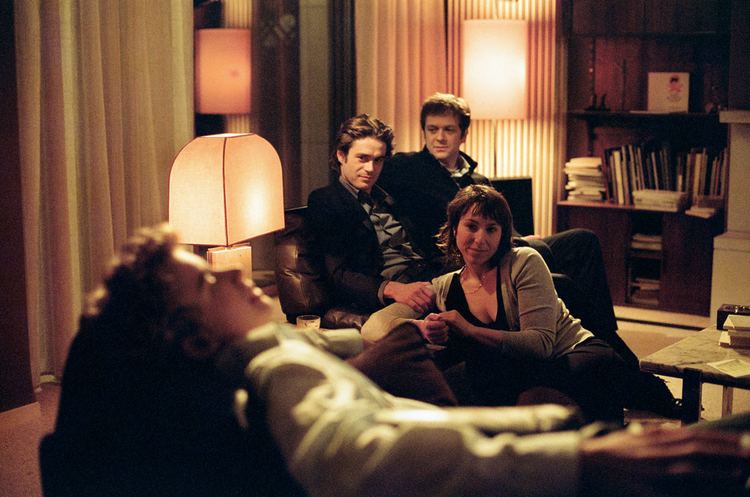 Jonas Bloquet as Jonas sleeping while he is being watched by the other characters in a scene from Private Lessons, 2008.