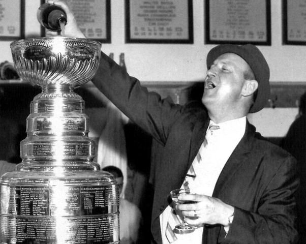 Punch Imlach Punch Imlach Pours Champagne into the Stanley Cup 1967