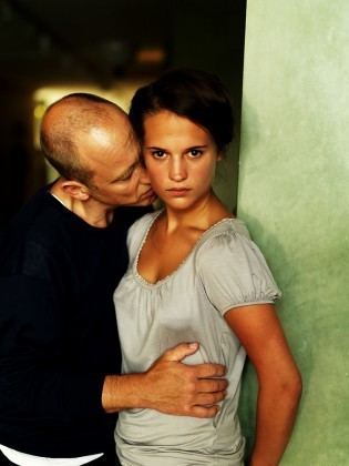 Samuel Fröler kissing Alicia Vikander's neck in the 2010 film, Pure