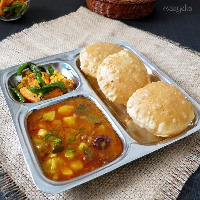 Puri bhaji Poori Bhaji Raswala Bateta nu Shaak Potatoes in spicy vegetarian
