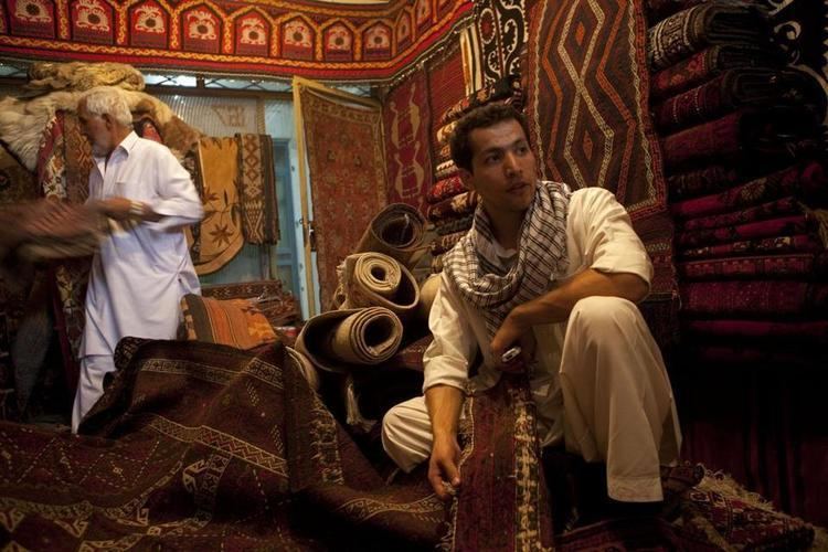 Qais Akbar Omar Afghan author carpet seller BU student tells his