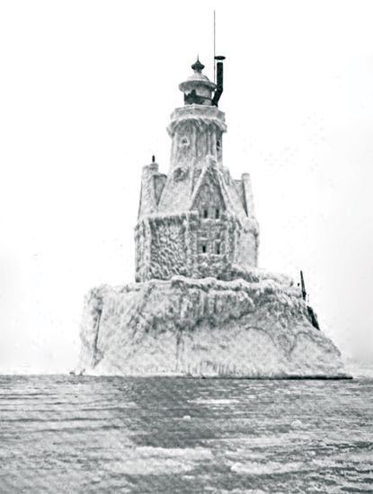 Racine Reef Light Racine Reef lighthouse encased in ice Wisconsin httpwww