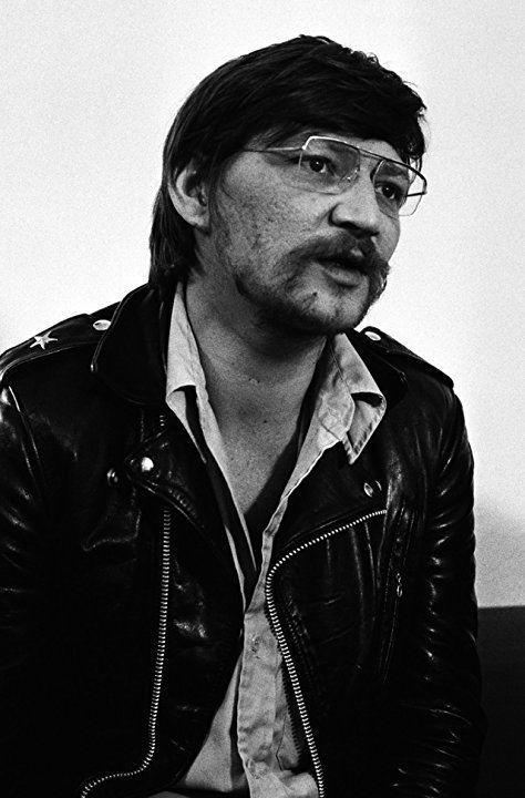 Rainer Werner wearing a black jacket and a pair of eyeglasses