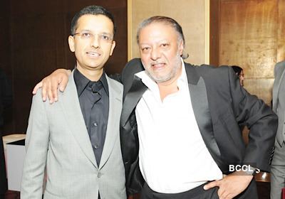 Raj Matharu Dixit Joshi and Raj Matharu pose for shutterbugs during a party