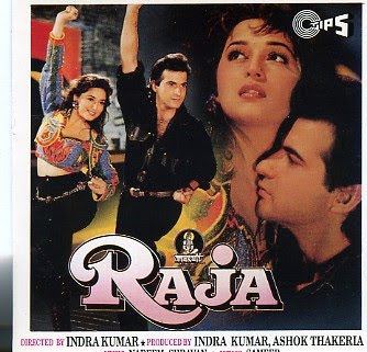 Poster of "Raja", starring Madhuri Dixit wearing a colorful top and black pants, and Sanjay Kapoor wearing black long sleeves and black pants.