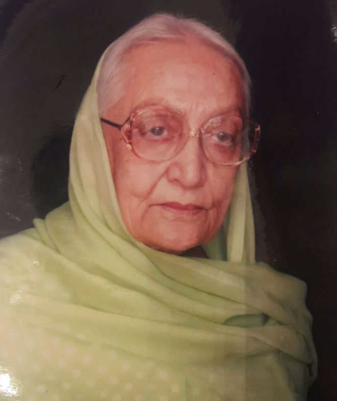 Rajmata Mohinder Kaur of Patiala wearing a green hijab and eyeglasses