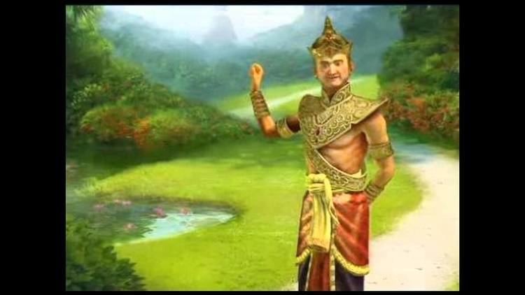 Ram Khamhaeng is in the garden while wearing a head and body armor, armlet, and red skirt