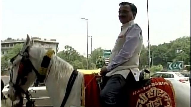 Ram Prasad Sharma BJPs Ram Prasad Sharma comes to Parliament on horse to protest Odd