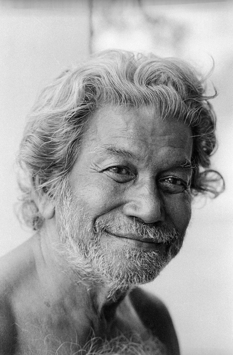 Ramkinkar Baij (26.05.1906 – 02.08.1980) smiling with gray hair and having a beard, mustache and hair on chest