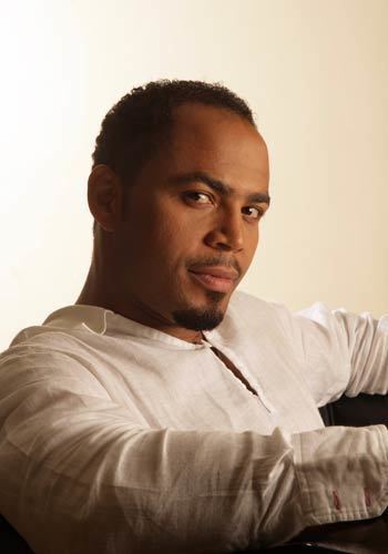 Ramsey Nouah wearing white long sleeves