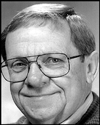 Ray Fulmer smiling and wearing eyeglasses