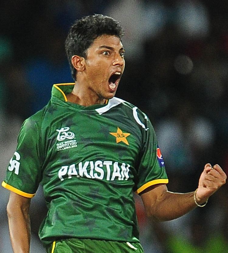 Raza Hasan Raza Hasan reacts after taking a wicket off his first over