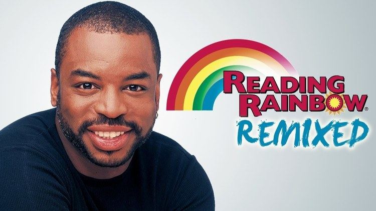 Poster of Reading Rainbow Remixed, a 1983 American educational children's television series featuring the host LeVar Burton smiling, with a beard and mustache, wearing an earring and black shirt.