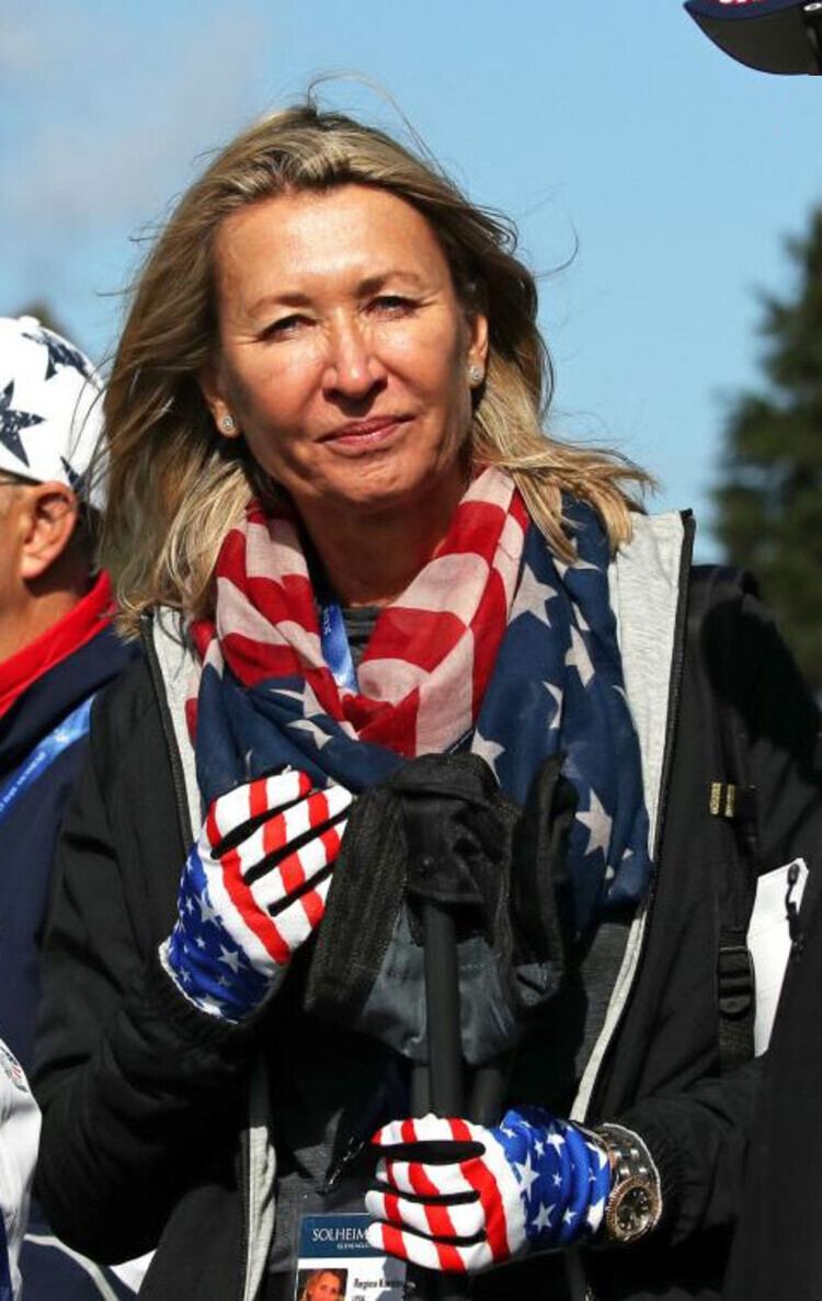 Regina Rajchrtová wearing black jacket, scarf and gloves with American flag design