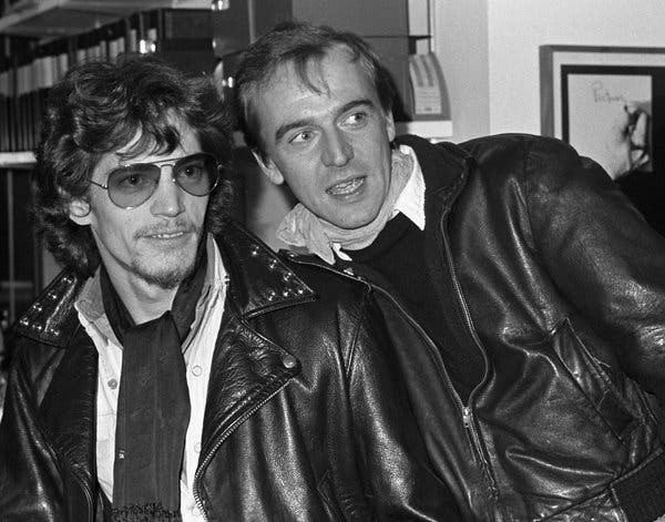 Robert Mapplethorpe, left, at one of his exhibitions with Rene Ricard in 1977.