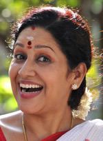 Renuka's big smile while her hair tied back